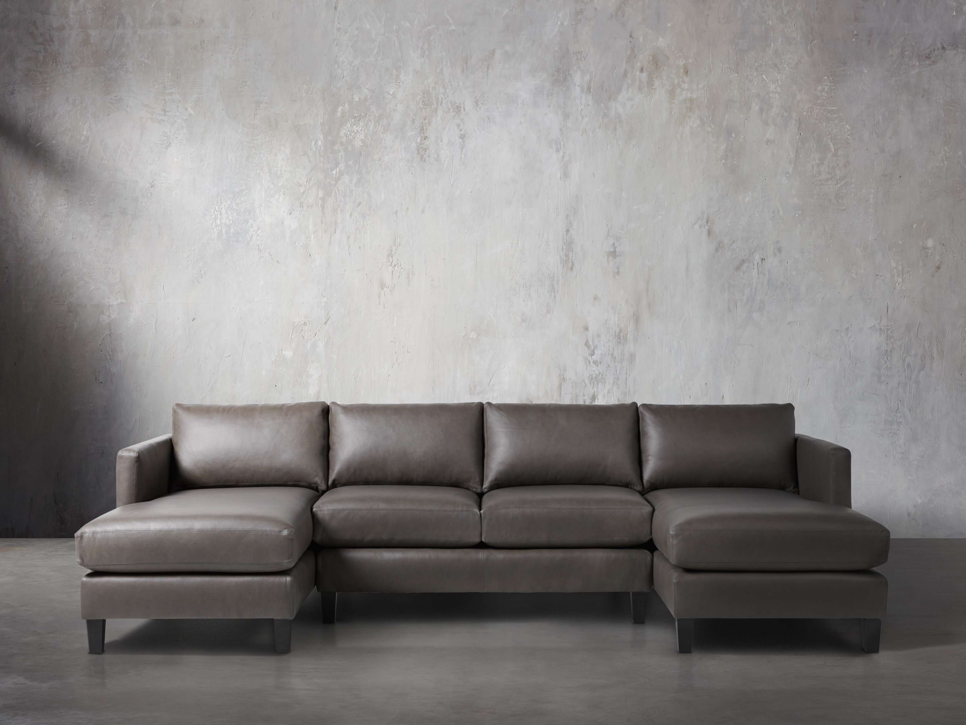 Taylor 118" Leather Three Piece Sectional, slide 1 of 5