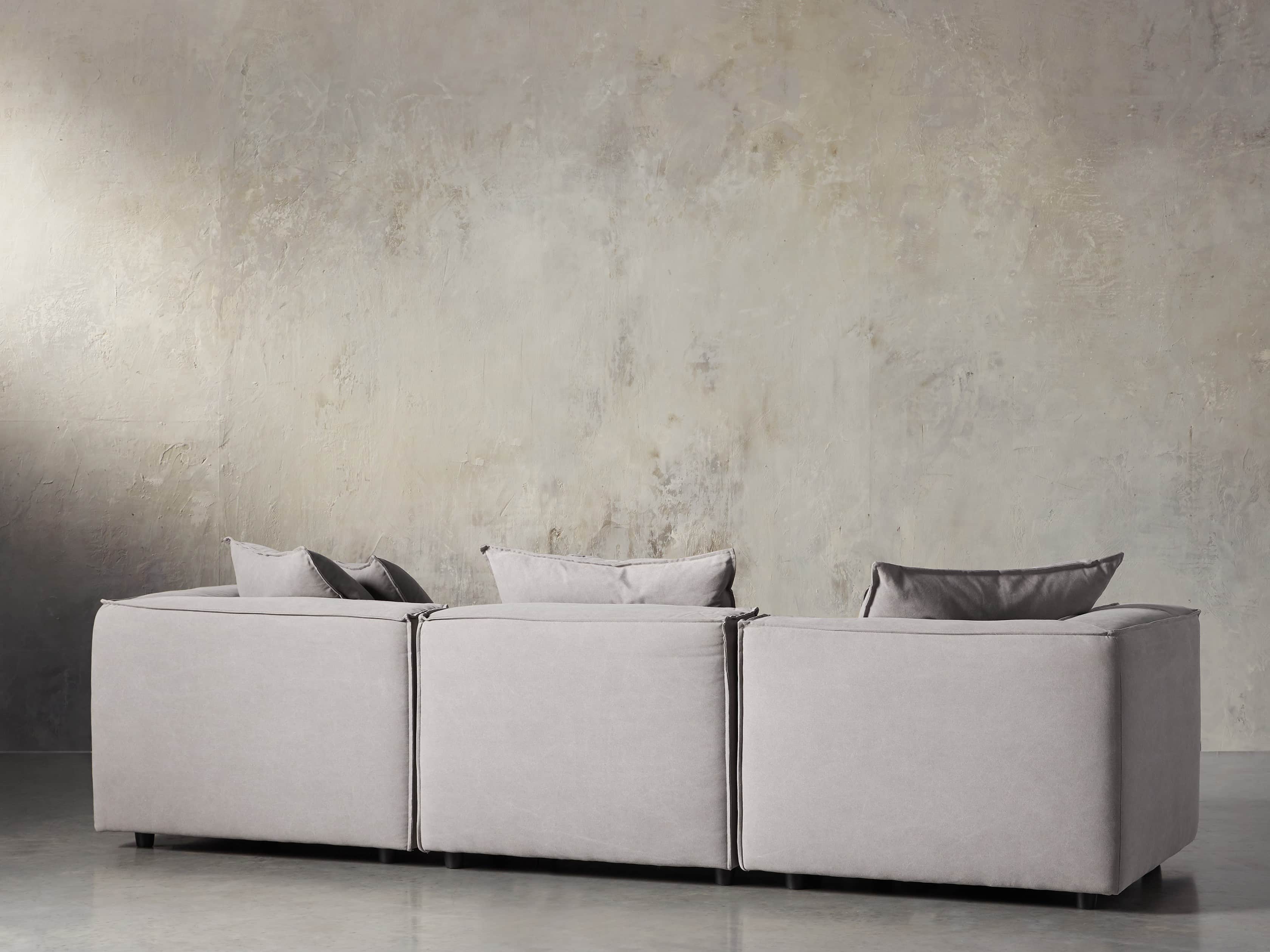 Coburn Upholstered 124" Three Piece Sectional