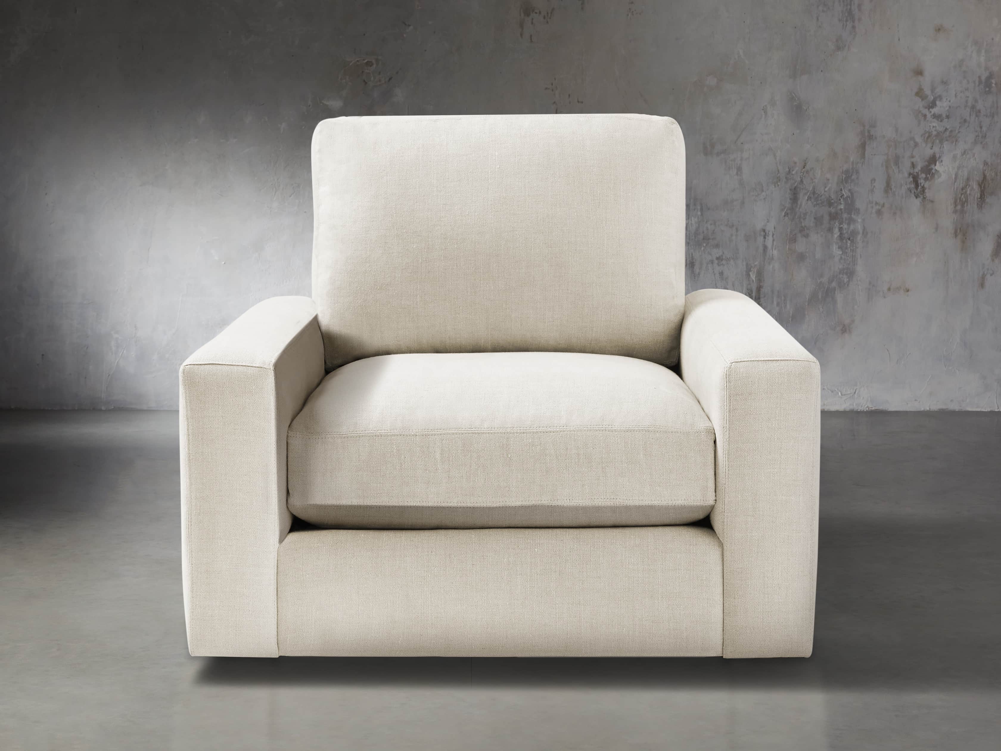 Remington Upholstered 43" Petite Swivel Chair, slide 1 of 5