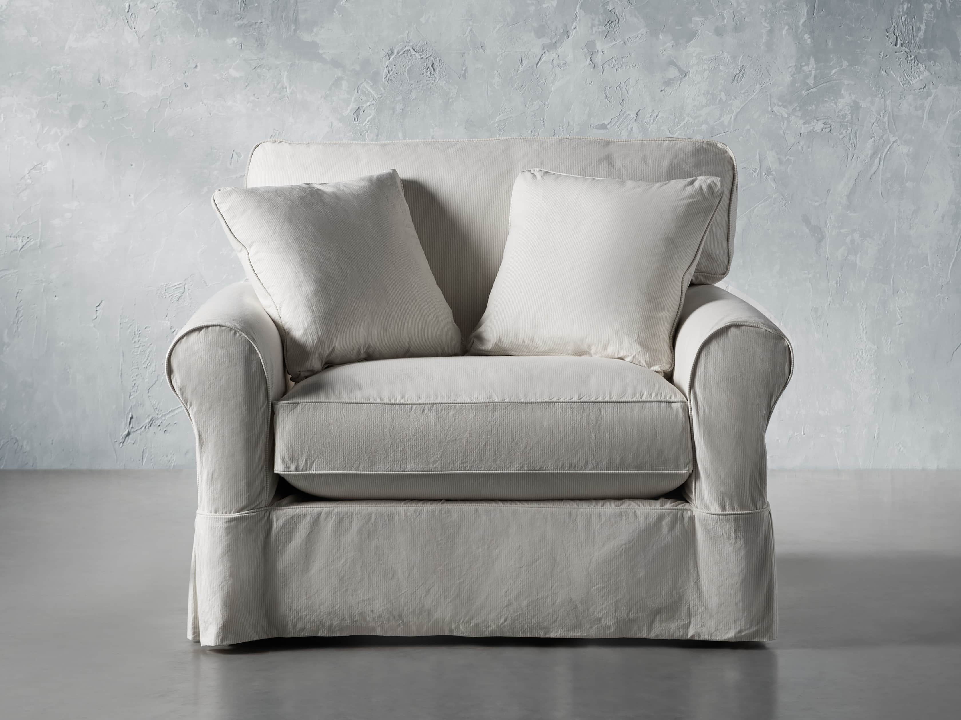 white slipcovered chair