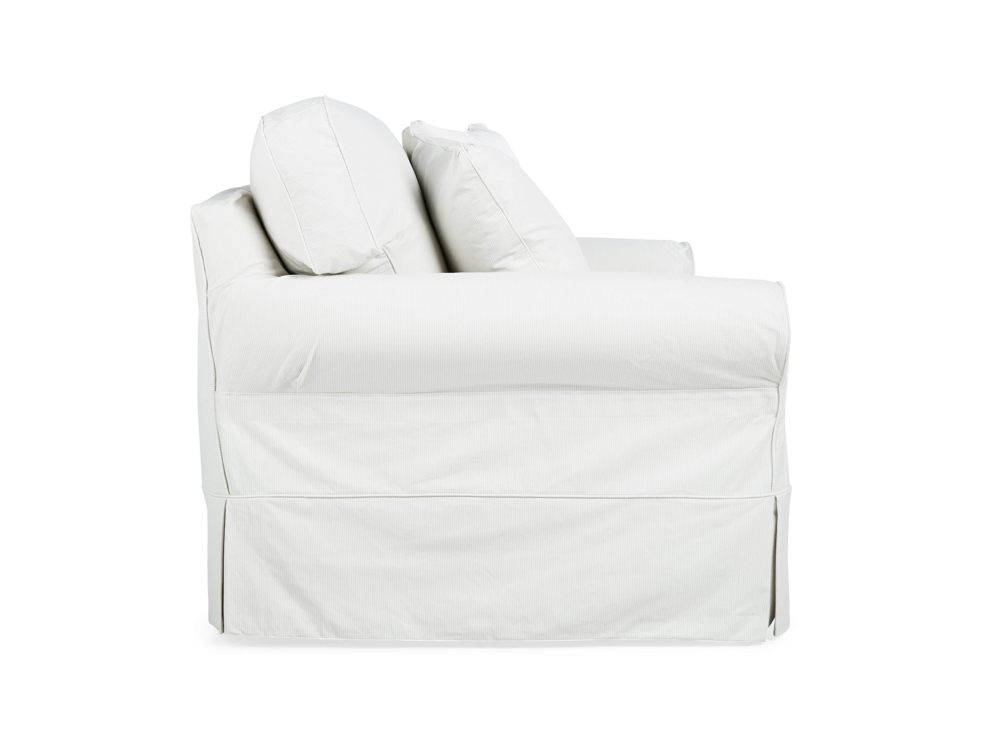 white slipcovered chair