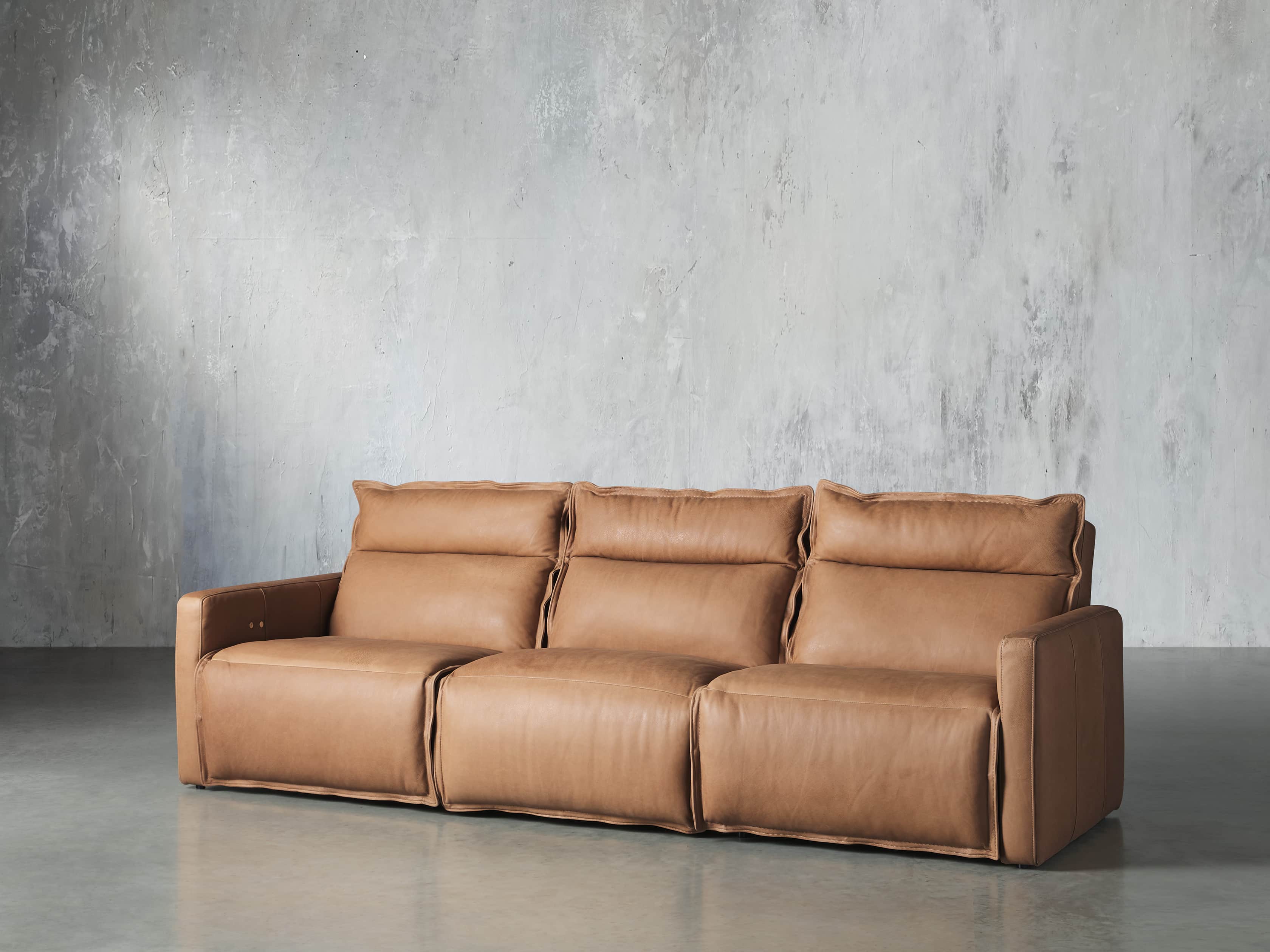 Rowland Leather Three Piece Motion Modular Sofa Arhaus