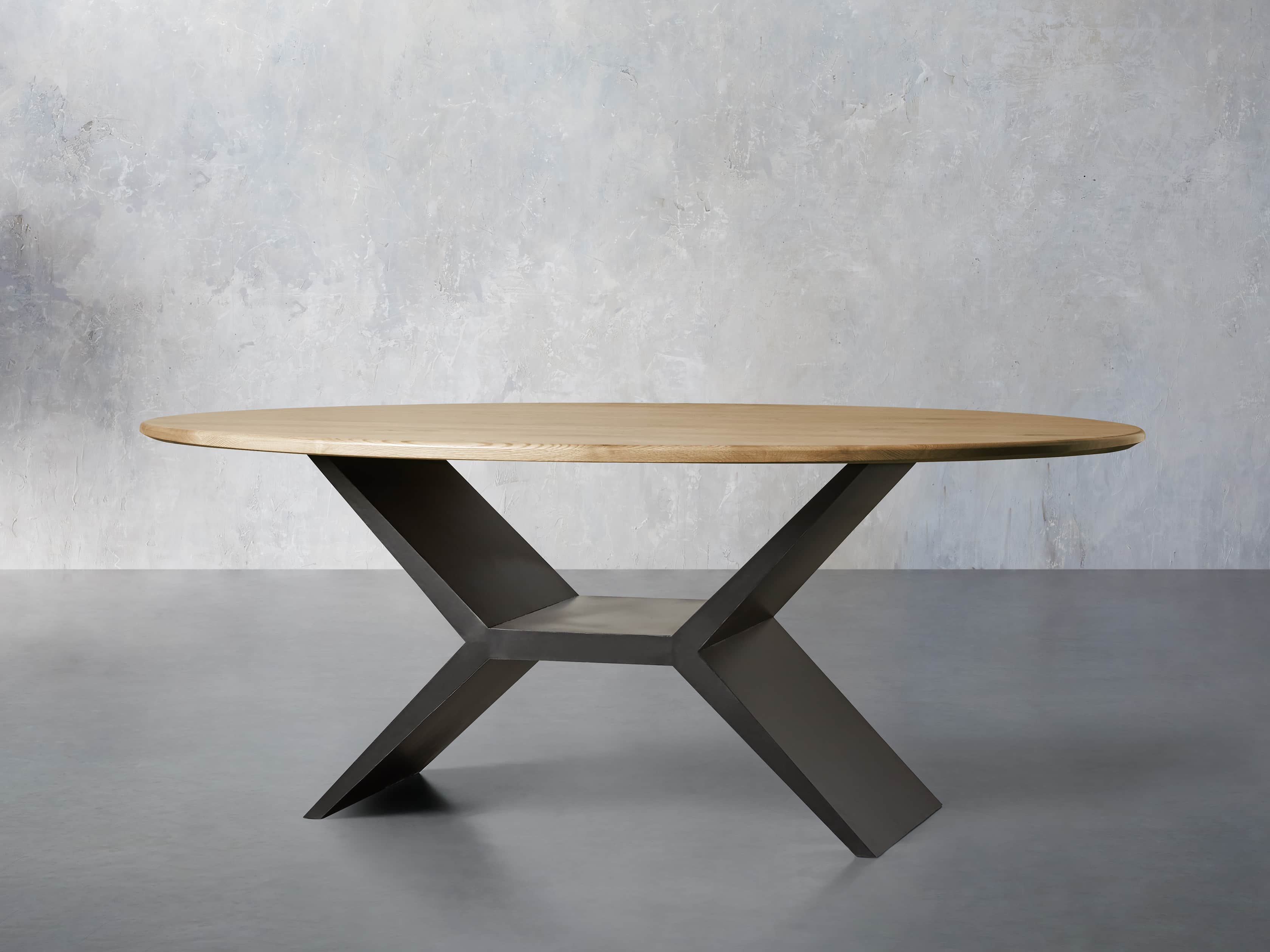 Jacob Oval Dining Table with Vertex Base Arhaus