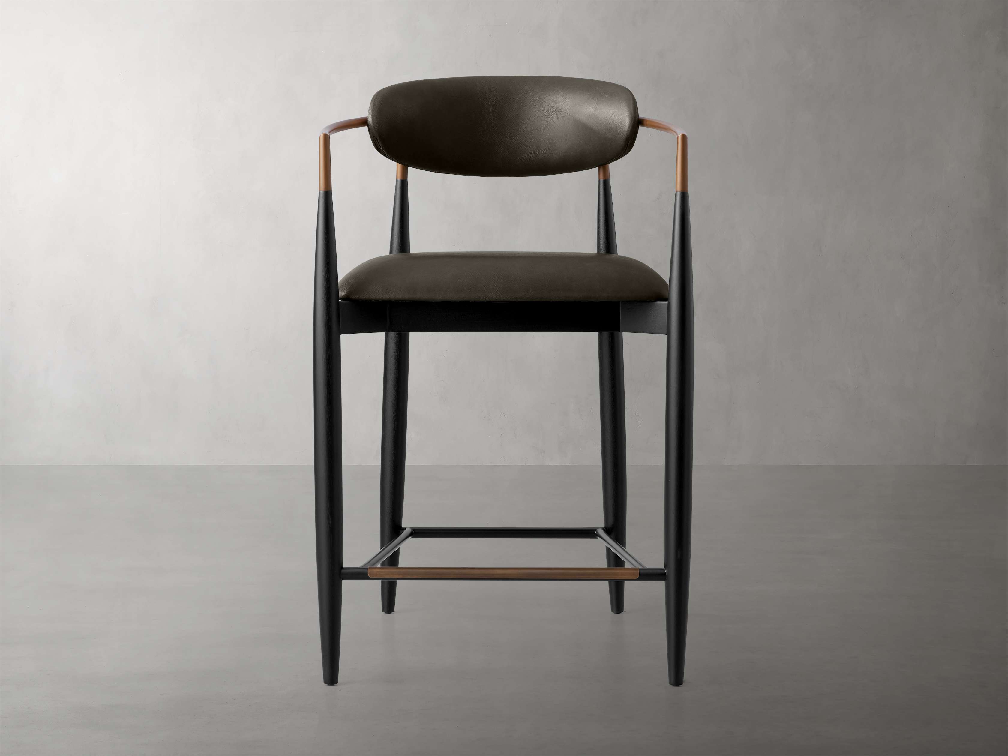 Jagger Faux Leather Stool in Black with Antique Brass Leather Fabric in Brown Arhaus