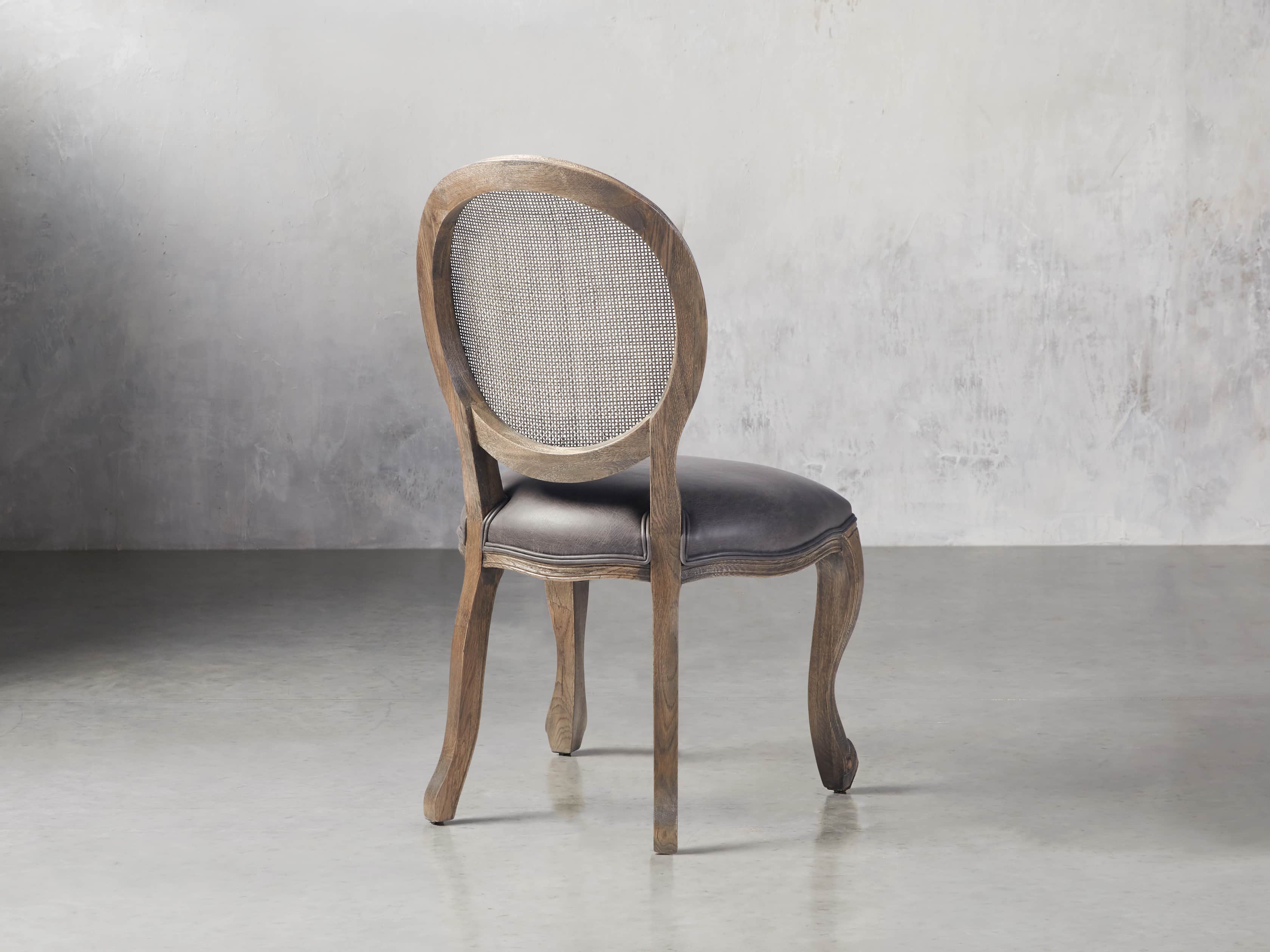 Margot Cane Back Dining Chair in Top Grain Smoke Arhaus