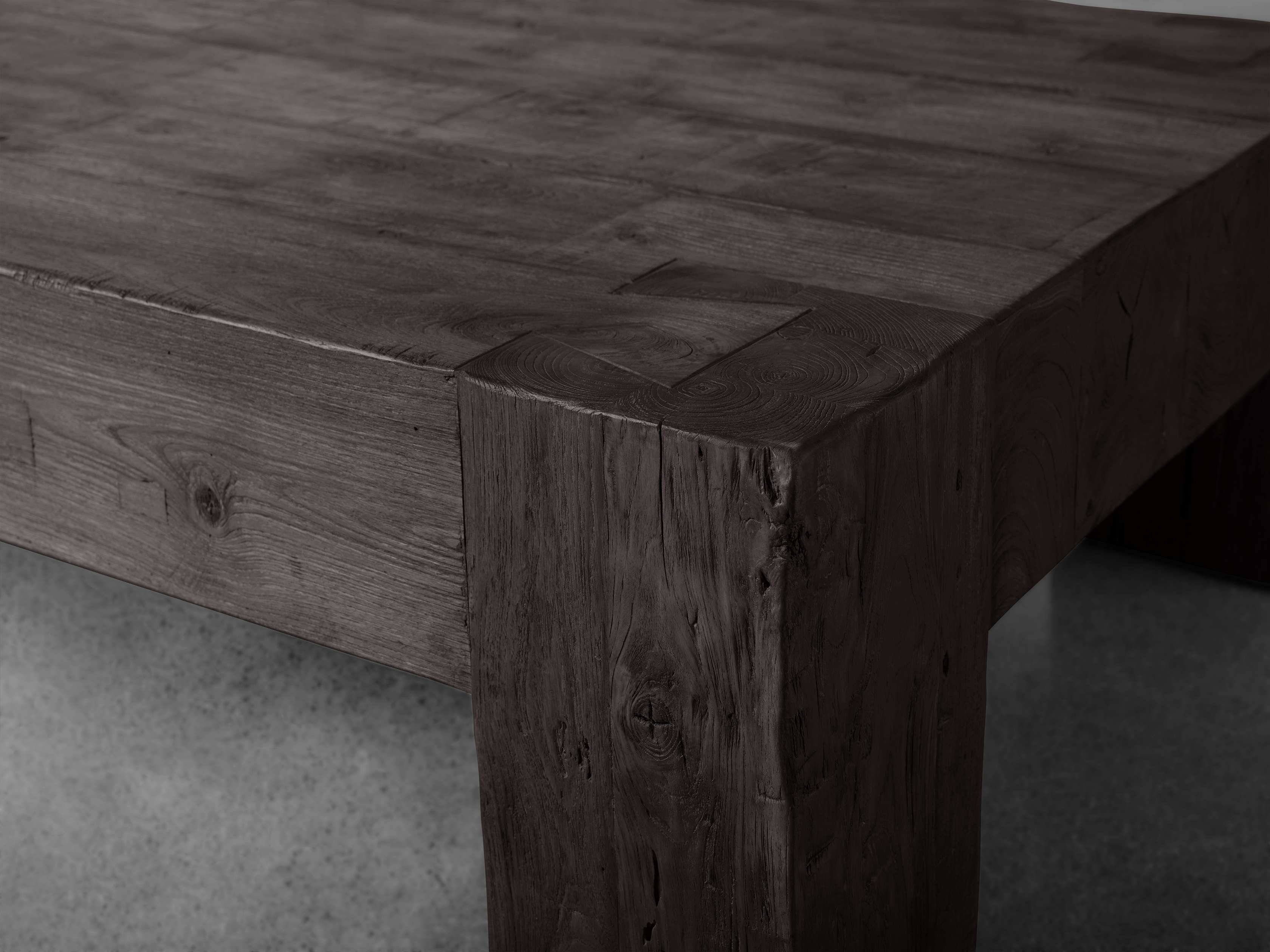 Close-up view of the Ubud Coffee Table showing its textured reclaimed teak wood construction and gray hand-waxed finish.