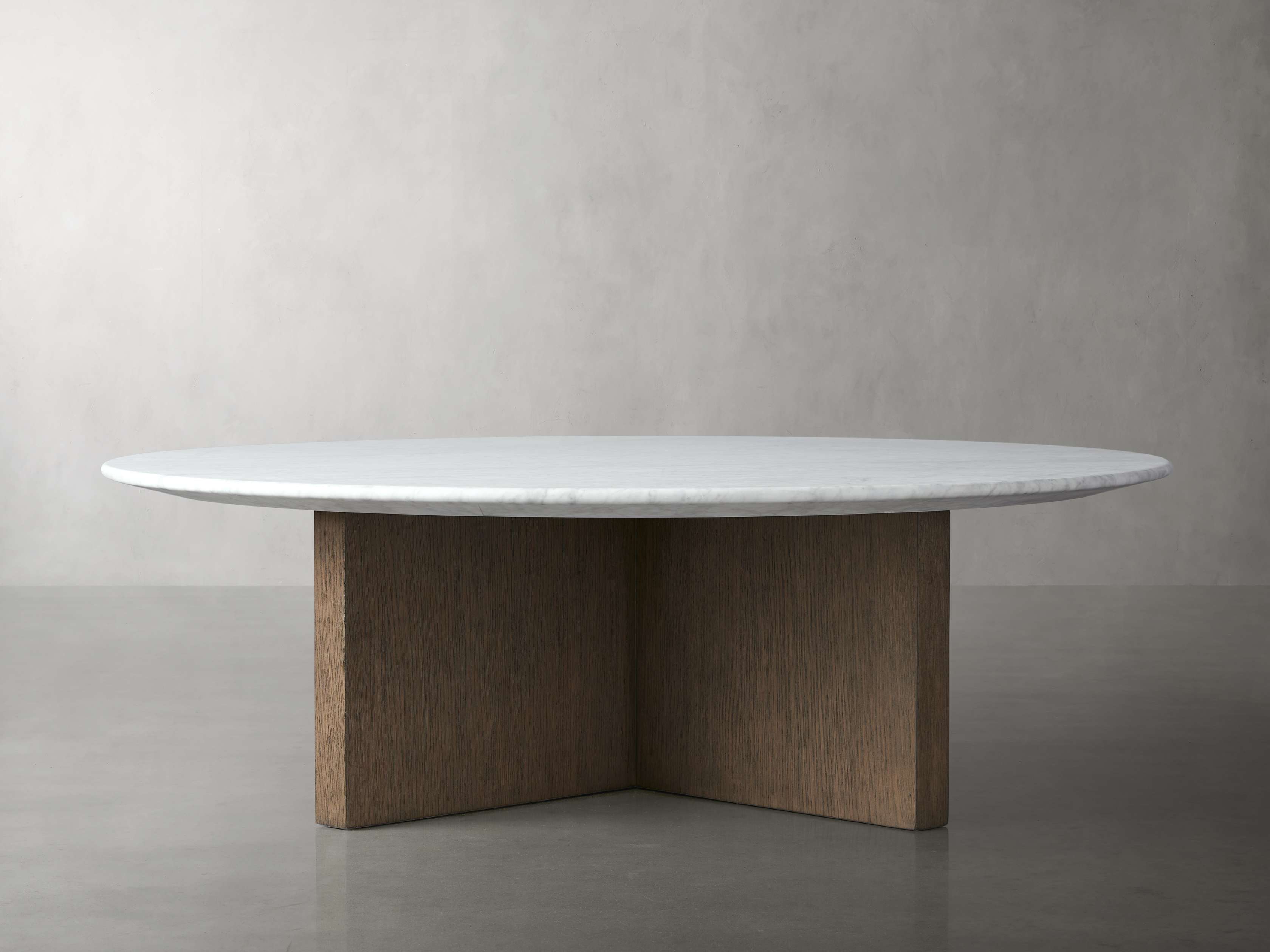Saint Germain Round Coffee Table with Clement Base in Stone in Brown Arhaus