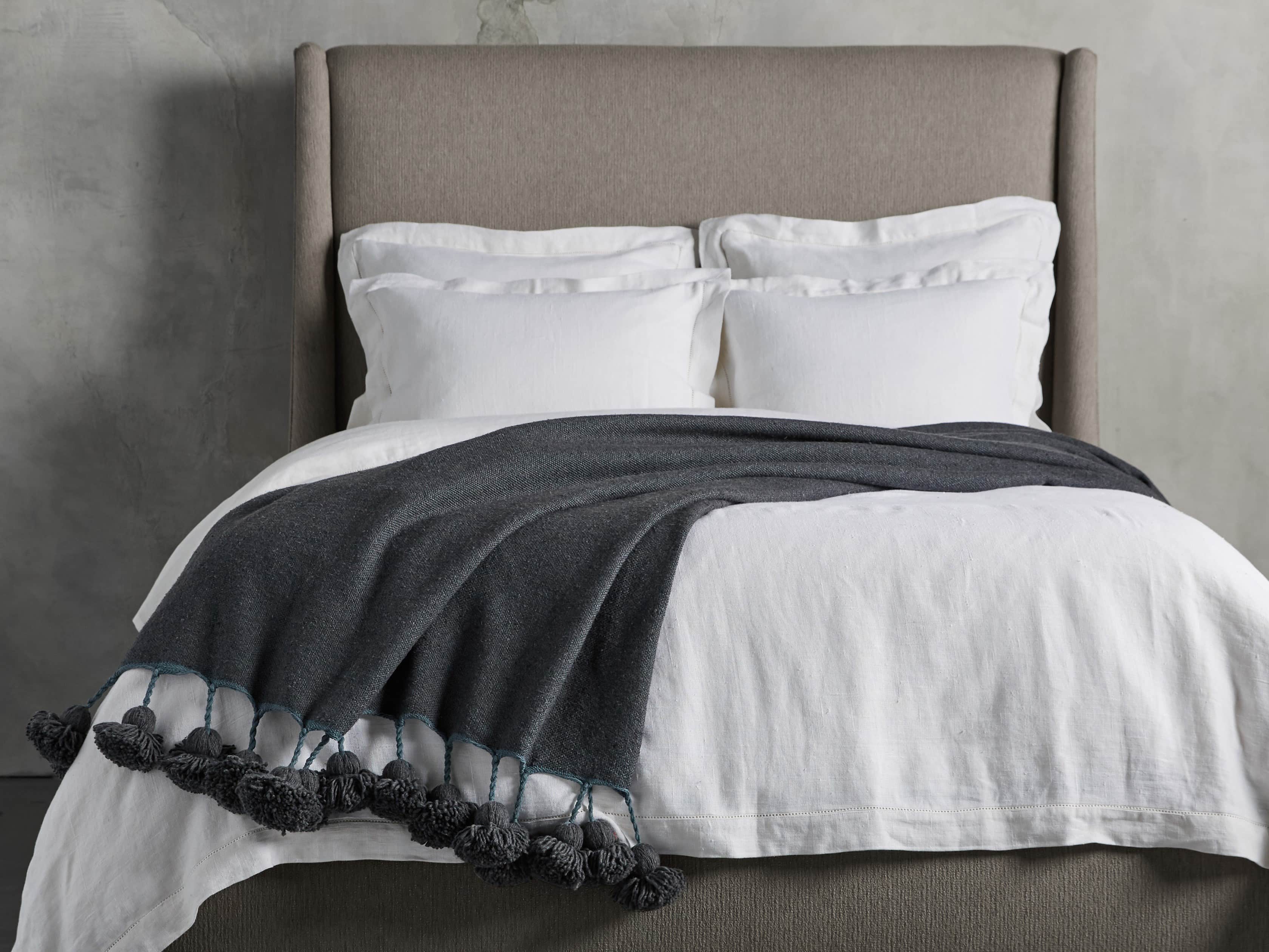 Moroccan Pom Pom Blanket in Navy