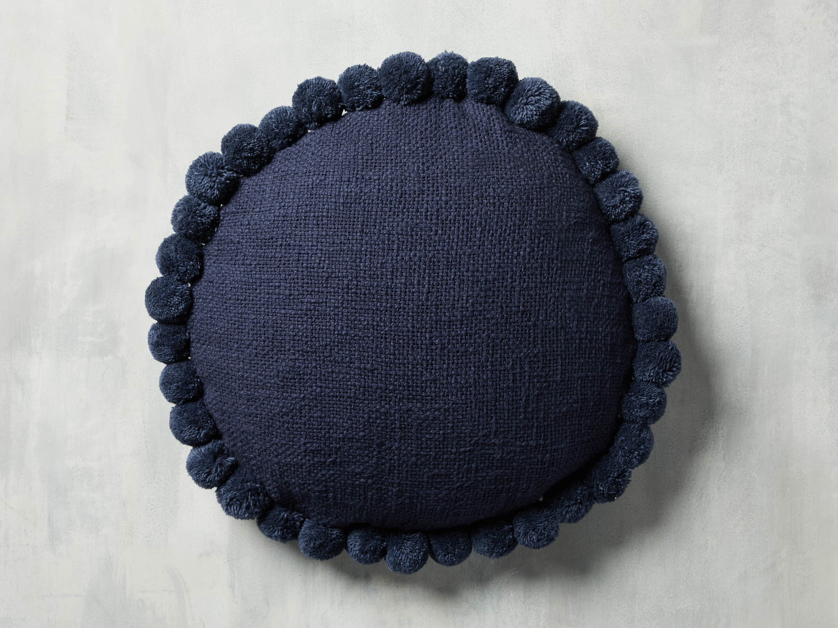Round Pom Pom Pillow in Navy, slide 2 of 3