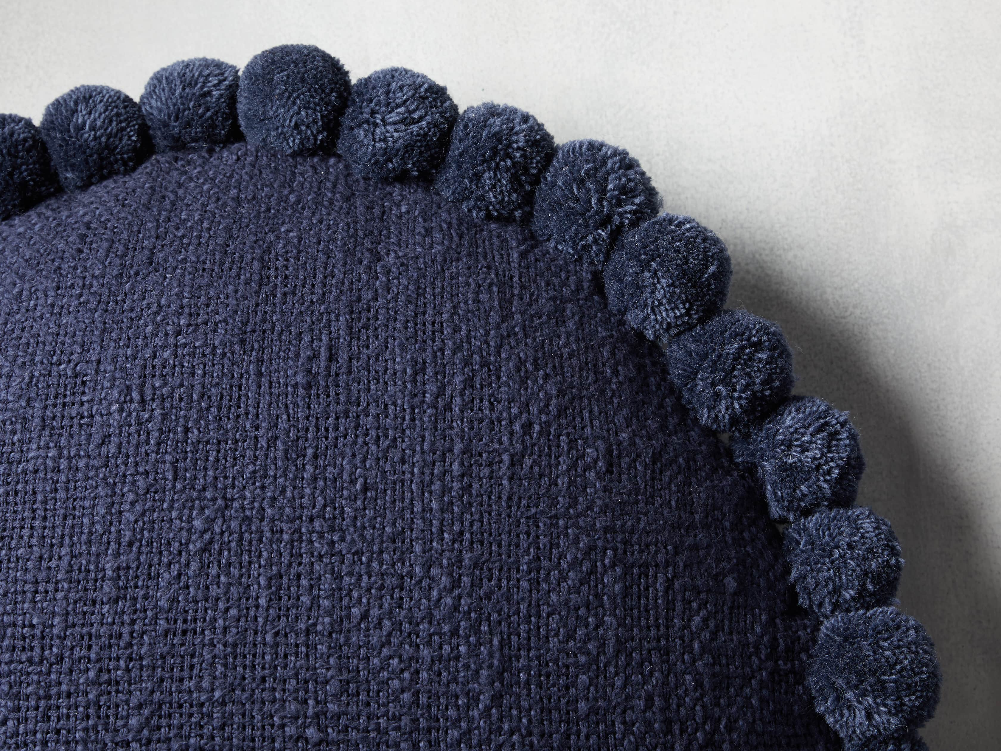 Round Pom Pom Pillow in Navy, slide 3 of 3