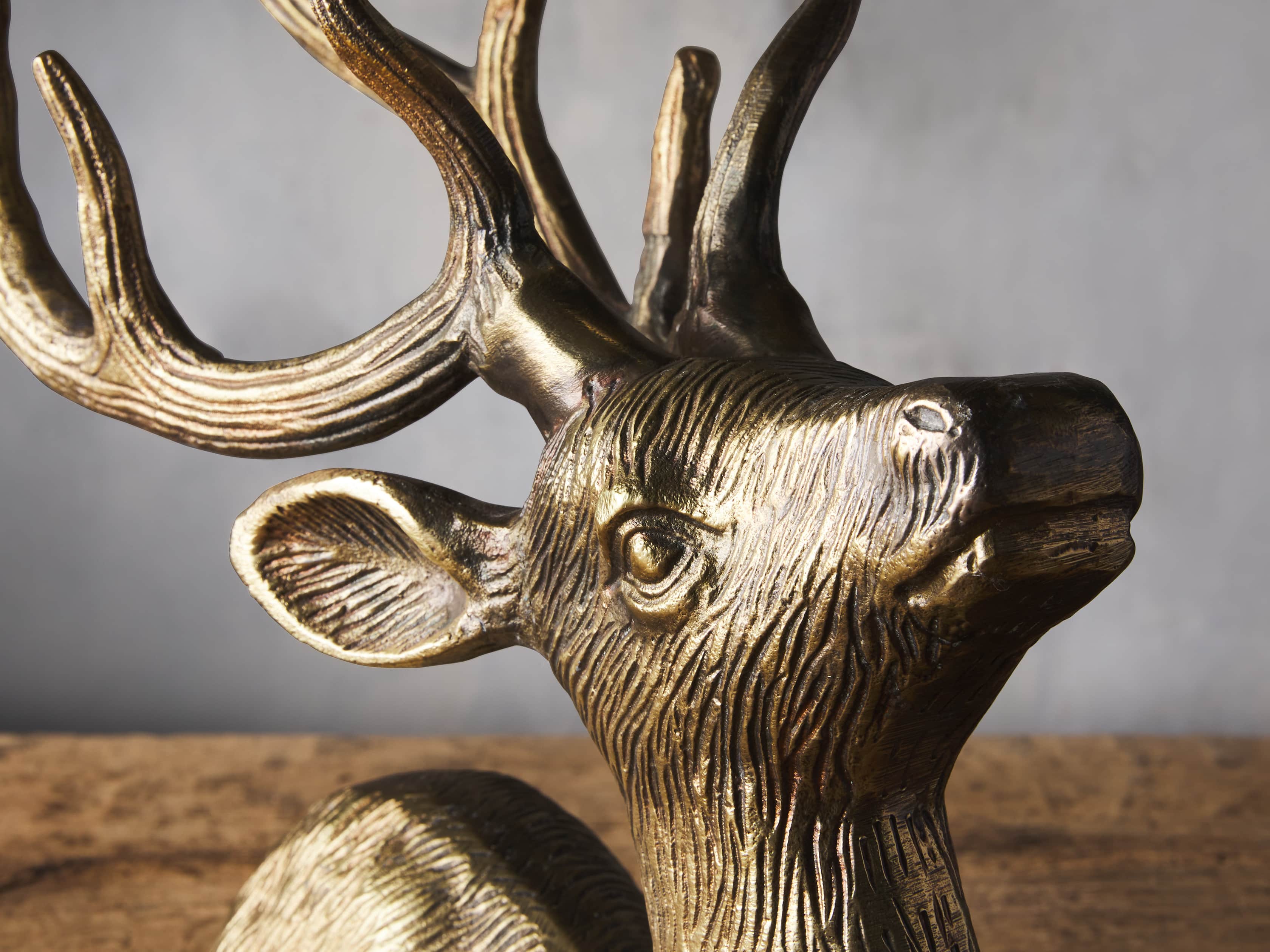 Bronze sitting reindeer pillar candle holder decor