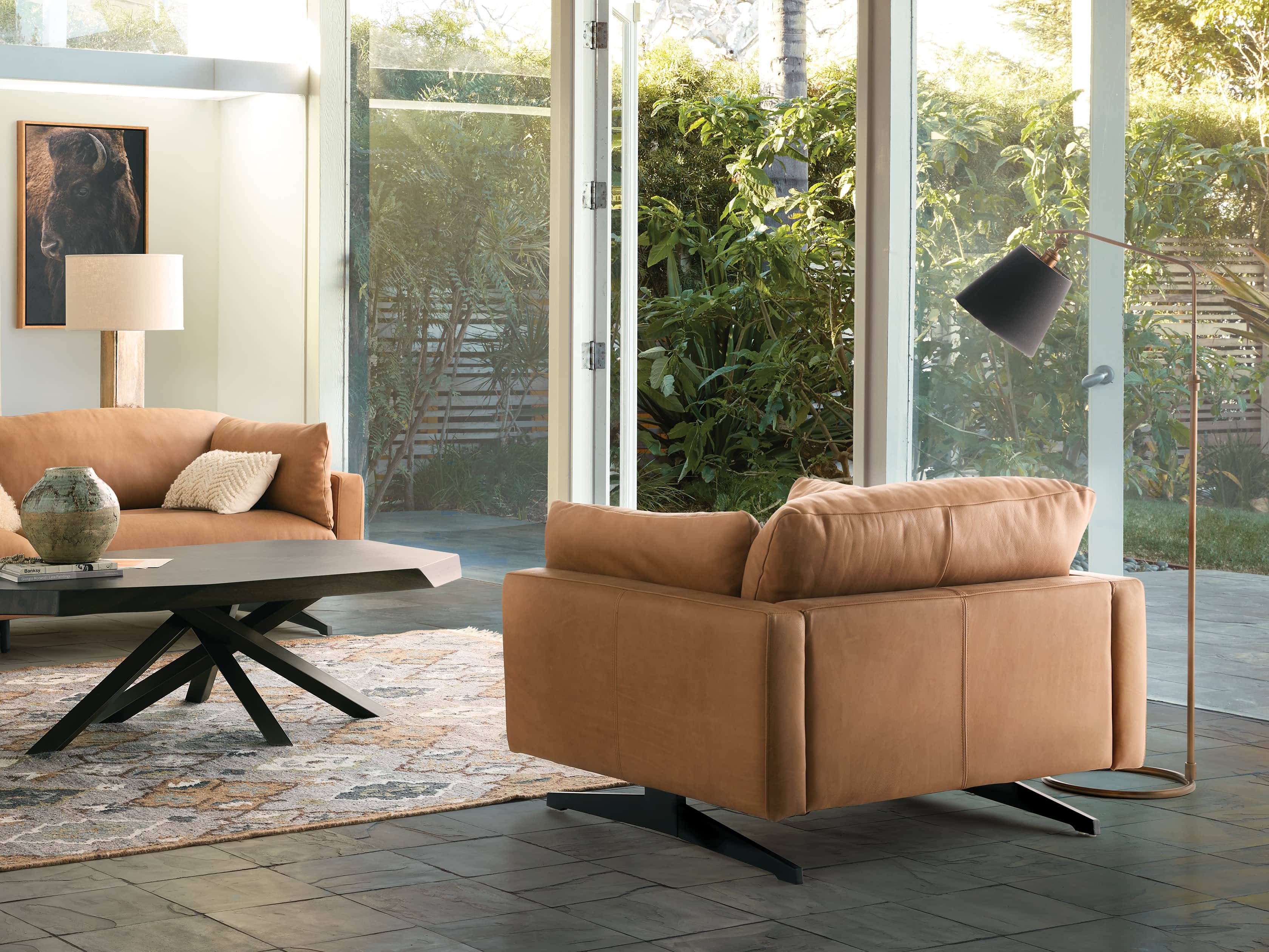 Kellen Floor Lamp With Black Shade in Antiqued Brass, slide 1 of 10