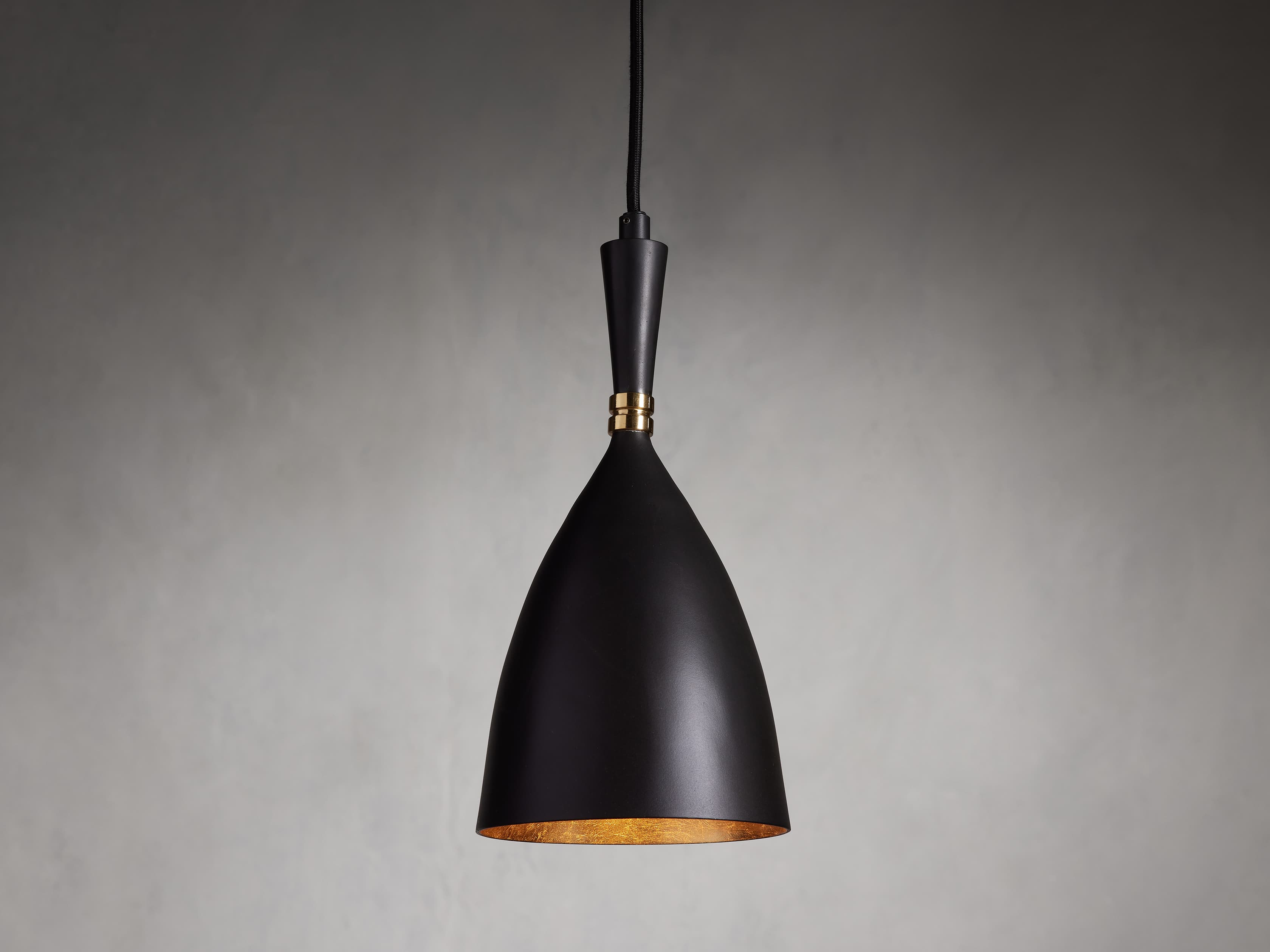 Our Watley White Cone Pendant boasts a modern and minimalistic design with  a chic brass finish on its inter…