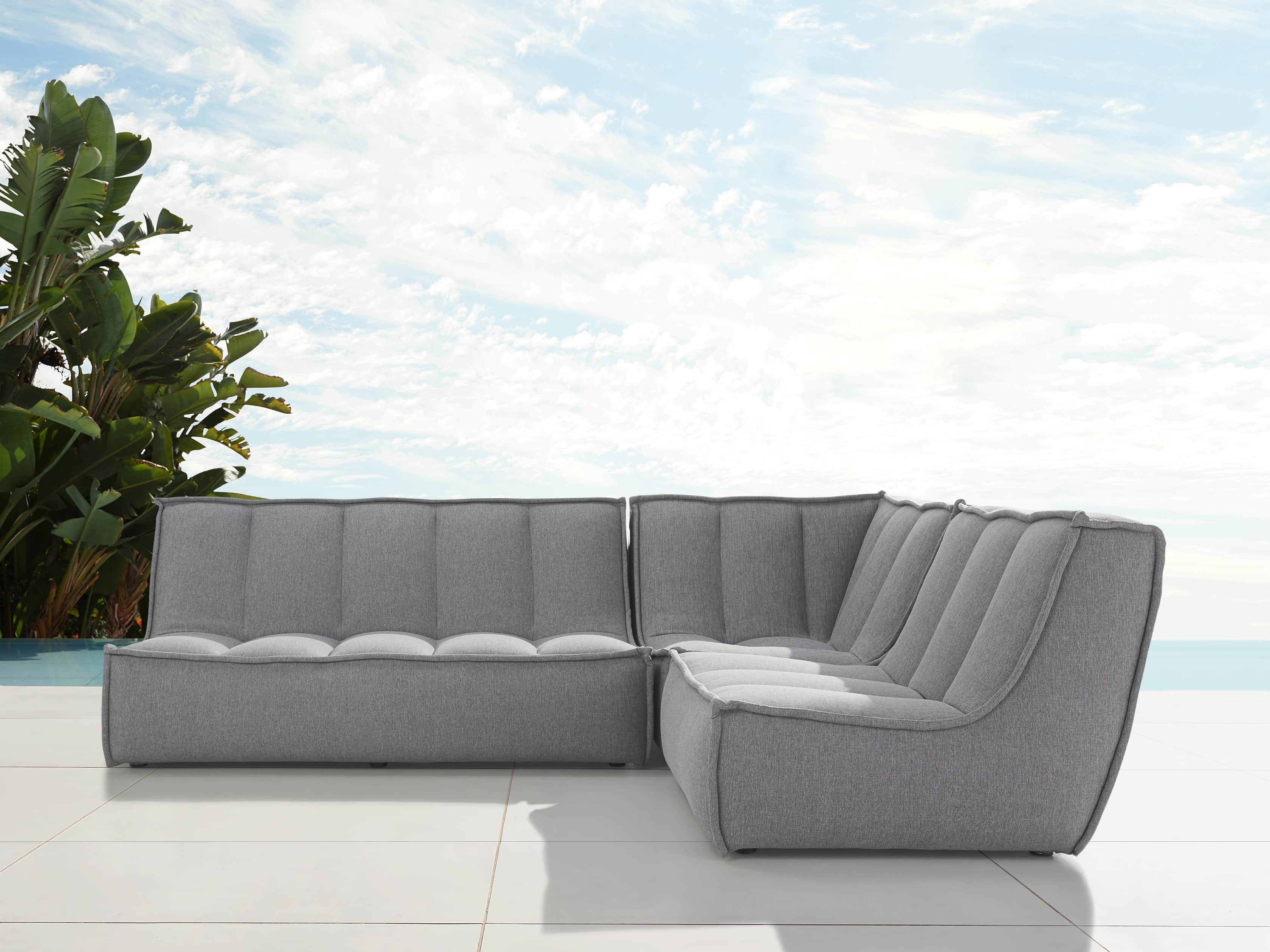 Porto Outdoor Upholstered 99" Three Piece L Sectional in Southend Grey, slide 1 of 7