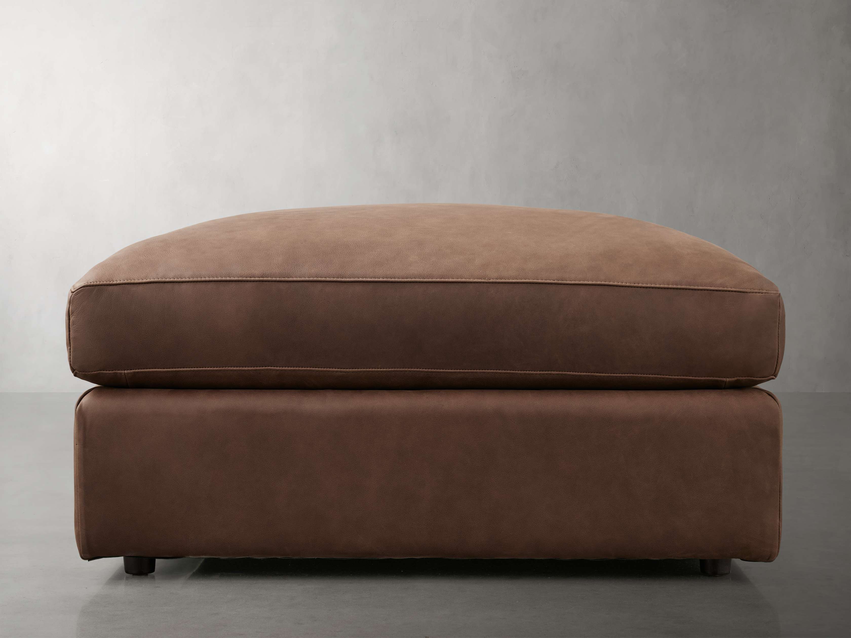 Vernon Ottoman in Leather Arhaus