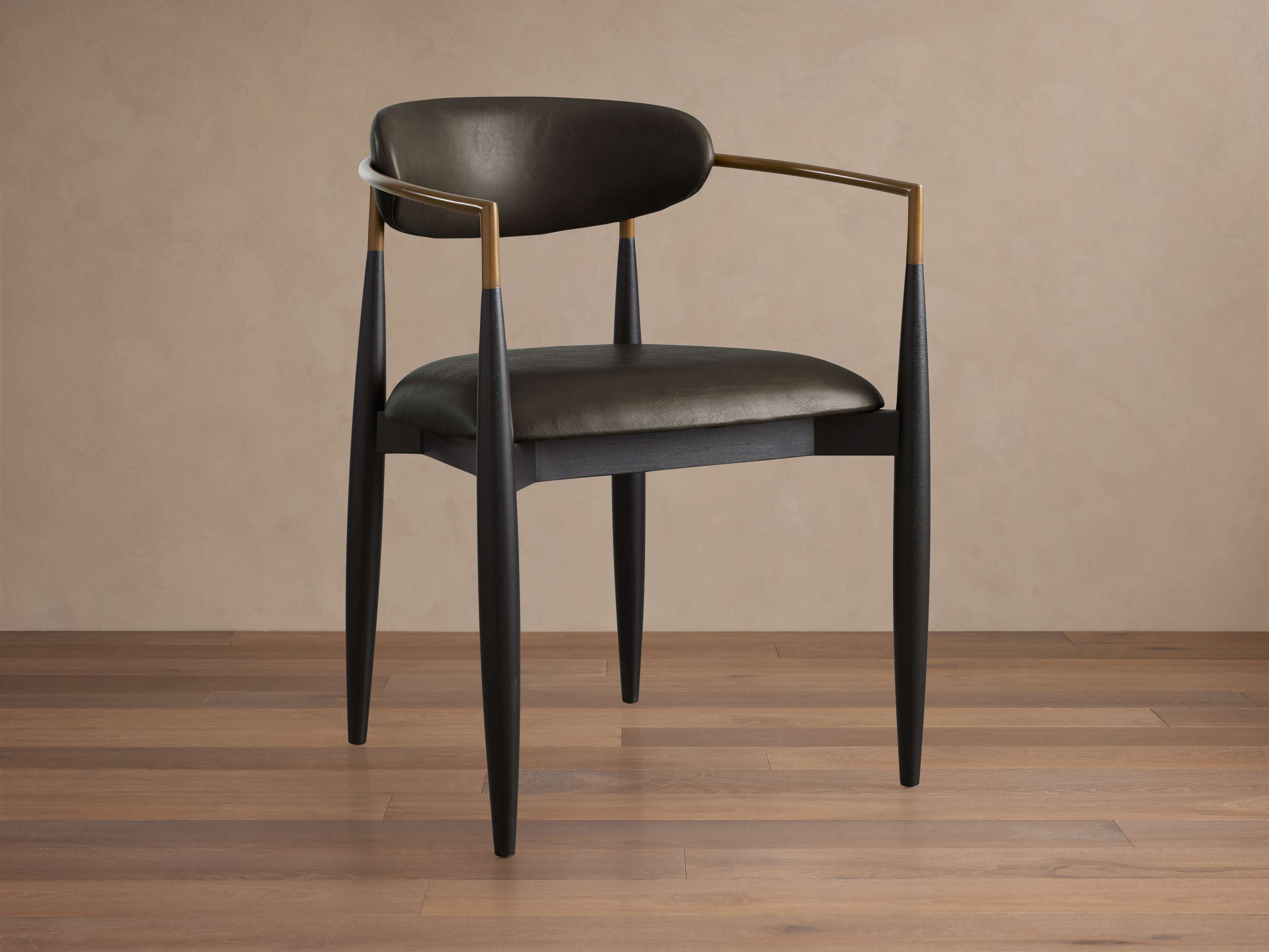 Jagger Faux Leather Dining Arm Chair
– Arhaus