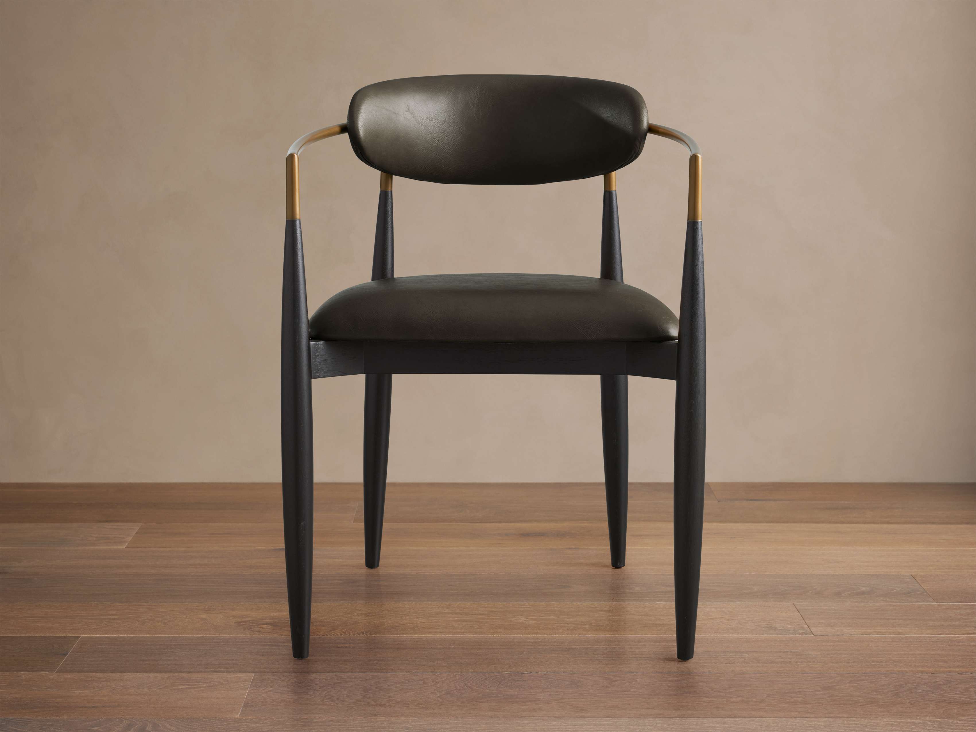 Jagger Faux Leather Dining Arm Chair
– Arhaus