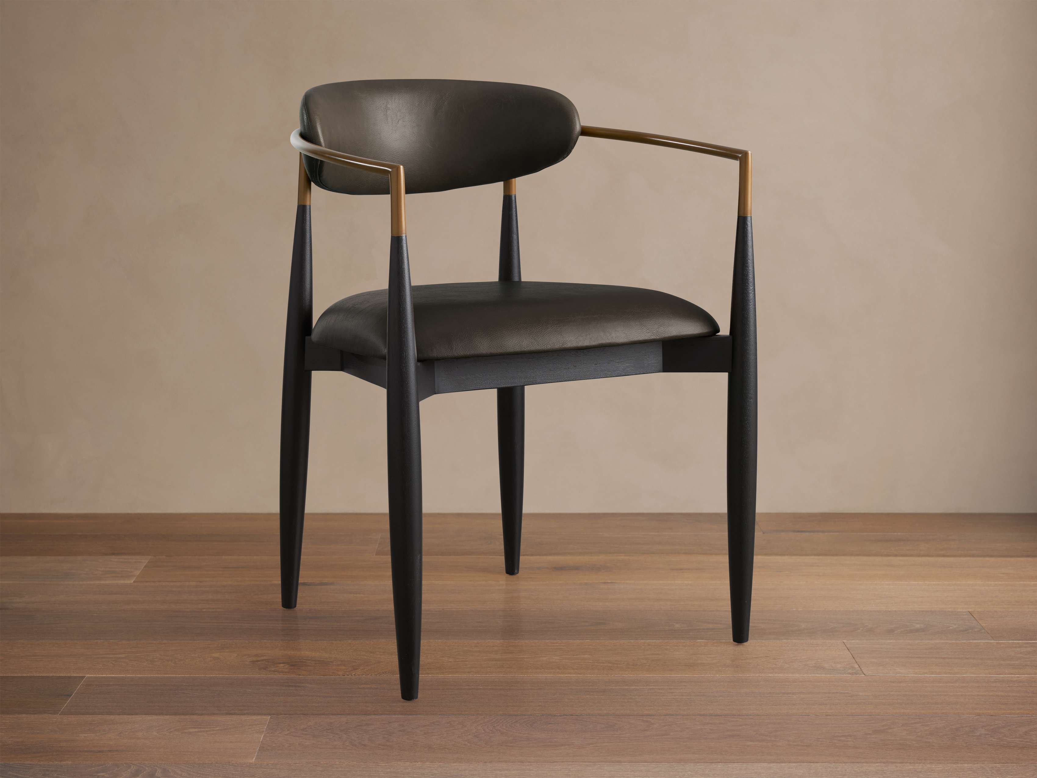 Jagger Faux Leather Dining Arm Chair
– Arhaus