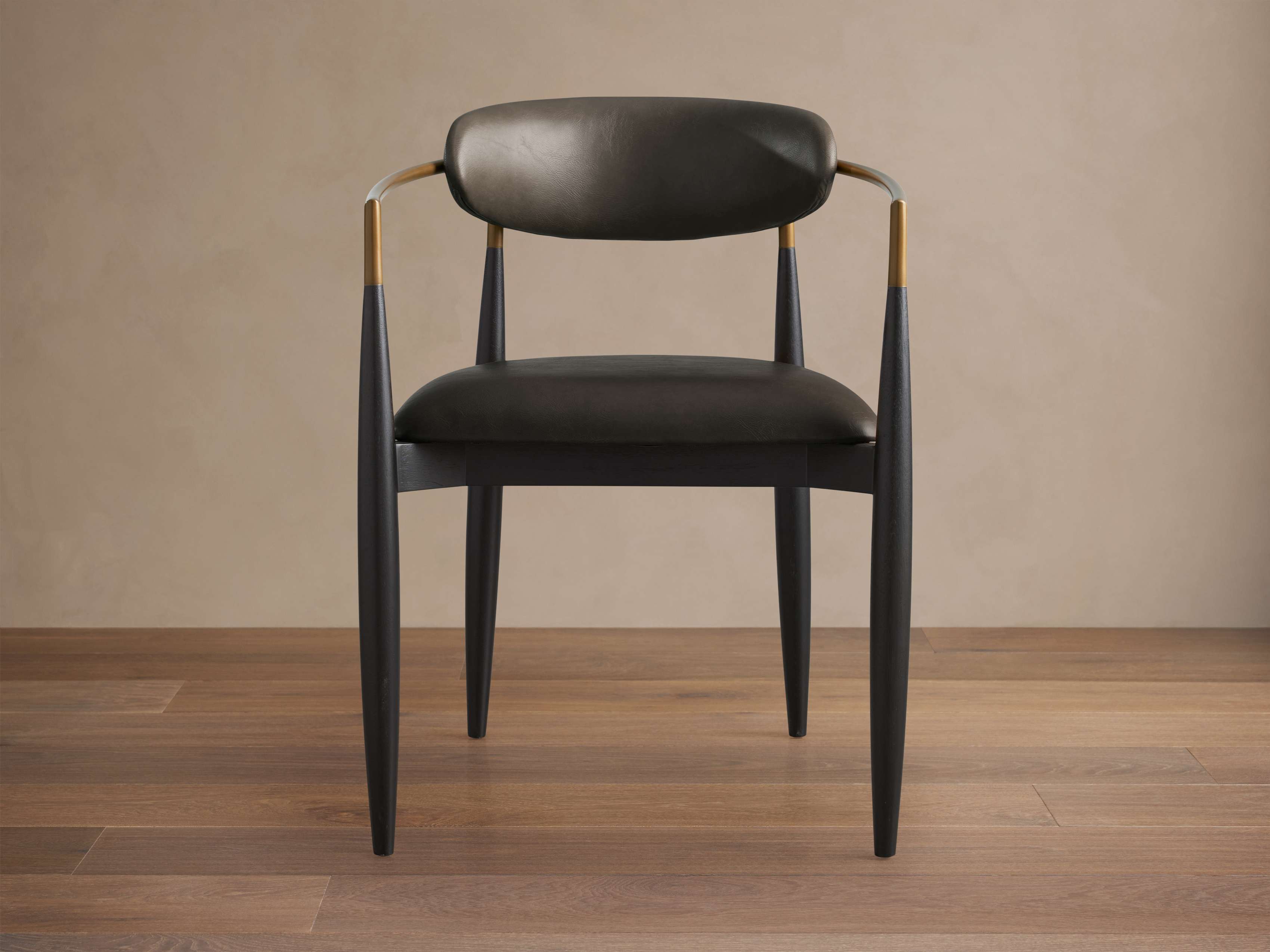 Jagger Faux Leather Dining Arm Chair
– Arhaus