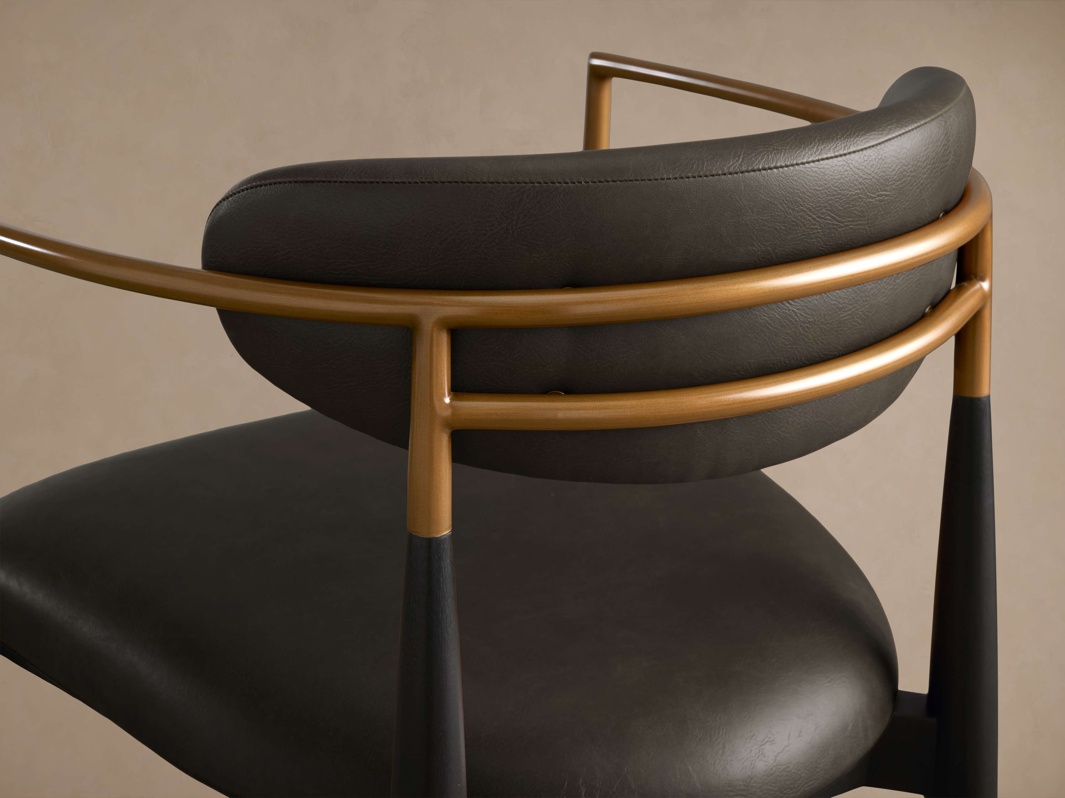 Jagger Faux Leather Dining Arm Chair
– Arhaus