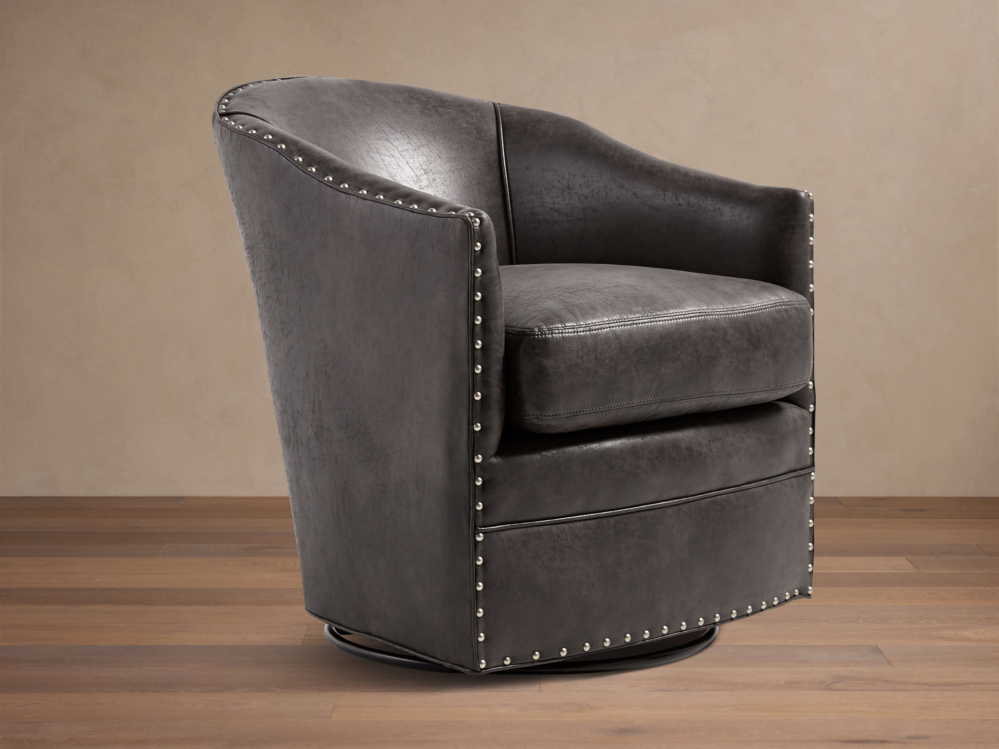 Giles Faux Leather Swivel Chair with Nailheads – Arhaus
