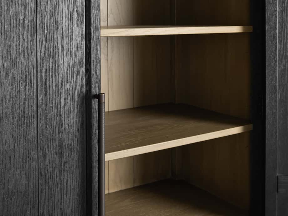Dark oak Hattie Cabinet showing open door with visible reeded handle, shiplap paneling, and adjustable shelves inside.