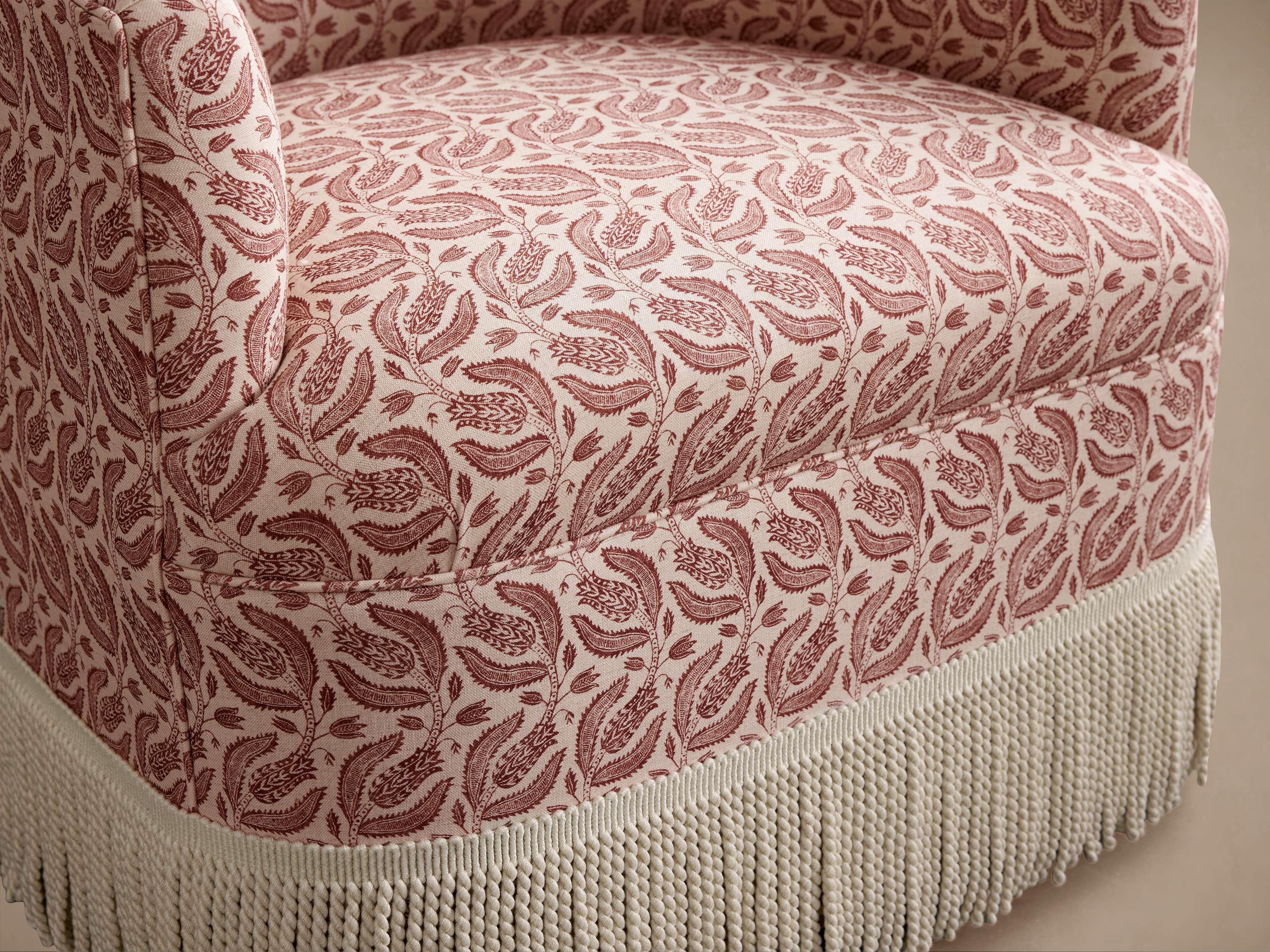 Close-up of chair's fabric and fringe